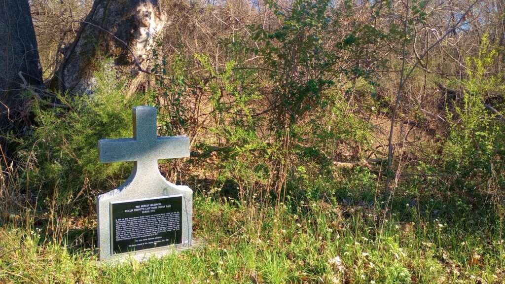 Historical marker for the Muncey Massacre.